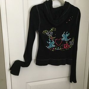 Designer cotton sweater with embroidery design.